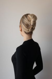 Step-by-step on how to style your hair with a claw clip, featuring an easy French twist tutorial for medium and long hair.